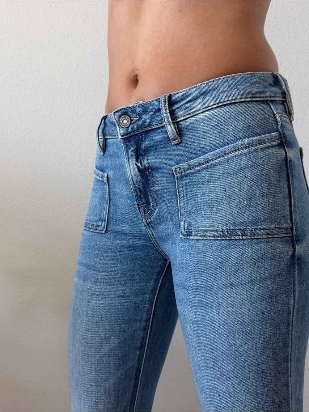 Mid-Rise Light Blue Flare Jeans with Front Patch Pockets - bought at SOTO